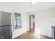 Efficient kitchen layout with stainless steel appliances and hardwood flooring at 600 Alexandria Pike, Anderson, IN 46012