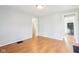 Minimalist living room with hardwood floors and neutral walls at 600 Alexandria Pike, Anderson, IN 46012