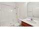 Compact bathroom featuring a walk-in shower, toilet, and vanity with a sink at 6017 Riva Ridge Dr, Indianapolis, IN 46237