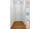 Entryway features hardwood floors and a door that leads to another room with a window at 6017 Riva Ridge Dr, Indianapolis, IN 46237