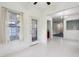 Inviting living room with bright white walls and natural light from a side window at 6017 Riva Ridge Dr, Indianapolis, IN 46237
