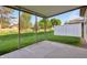 Covered patio area with a concrete floor, perfect for relaxing and entertaining outdoors at 6017 Riva Ridge Dr, Indianapolis, IN 46237