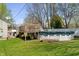 Backyard features a wooden deck with an above ground pool at 615 W Stop 11 Rd, Indianapolis, IN 46217