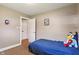 Bedroom with soft carpet and decor at 615 W Stop 11 Rd, Indianapolis, IN 46217