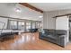 Relaxing living room with hardwood floors, ceiling fan, and lots of natural light at 615 W Stop 11 Rd, Indianapolis, IN 46217