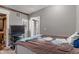 Calming bedroom featuring a connecting door to an additional room at 615 W Stop 11 Rd, Indianapolis, IN 46217