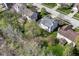 Aerial view of home with backyard, patio, and mature trees at 6205 Albury Dr, Indianapolis, IN 46236