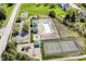Aerial view of a community pool, playground, and tennis court at 6205 Albury Dr, Indianapolis, IN 46236