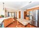 Bright kitchen with ample cabinet space, modern appliances, and seamless access to other living areas at 6205 Albury Dr, Indianapolis, IN 46236