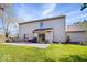 Exterior view of a home with a backyard patio and outdoor seating area at 6211 W Bayfront Shores, McCordsville, IN 46055