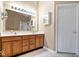 Bathroom featuring double sinks, a large mirror, and a clean, well-lit space at 6211 W Bayfront Shores, McCordsville, IN 46055