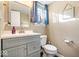 Well-lit bathroom with modern vanity, stylish mirror, and contemporary fixtures, providing a serene atmosphere at 6211 W Bayfront Shores, McCordsville, IN 46055
