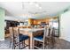 Modern kitchen featuring a large central island, stainless steel appliances, and plenty of counter space at 6211 W Bayfront Shores, McCordsville, IN 46055