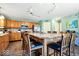 Bright kitchen boasts a large central island, stainless steel appliances, and ample cabinet storage at 6211 W Bayfront Shores, McCordsville, IN 46055
