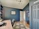 This is an office featuring built-in shelves, a peaked ceiling and cozy decor at 6220 Yellow Birch Ct, Avon, IN 46123