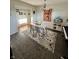 Inviting dining room with hardwood floors and a light wood table at 6226 Fairlane Dr, Indianapolis, IN 46259