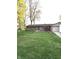 Charming brick ranch home with a well-manicured lawn and attached garage at 6226 Fairlane Dr, Indianapolis, IN 46259