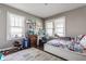 Bedroom featuring natural light, a cozy rug, and colorful decor for a personalized touch at 637 Berkley Rd, Indianapolis, IN 46208