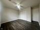 Cozy bedroom with hardwood floors and a closet for ample storage at 6458 Lupine Ter, Indianapolis, IN 46224