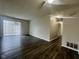Living room featuring hardwood floors and a bright sliding glass door at 6458 Lupine Ter, Indianapolis, IN 46224