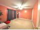Inviting bedroom with a ceiling fan, soft carpet, and plenty of natural light for a comfortable atmosphere at 7121 Fields Way, Indianapolis, IN 46239