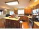Charming kitchen with wood cabinets, stainless steel appliances, and a convenient island at 7121 Fields Way, Indianapolis, IN 46239