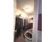 Well-organized walk-in closet with clothing racks and shelves, offering ample storage space at 7121 Fields Way, Indianapolis, IN 46239
