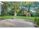 Great backyard with patio, fire pit, and shed in a well-landscaped yard, ideal for outdoor living at 7206 Halden Pl, Indianapolis, IN 46214