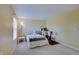 Bedroom featuring carpet flooring, a bed, and a small peloton at 825 Palisades Ct, Greenwood, IN 46143