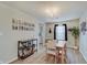 Bright dining room with wood floors, chandelier, and modern decor at 825 Palisades Ct, Greenwood, IN 46143