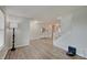 Spacious living room featuring neutral walls, wood floors, and staircase at 825 Palisades Ct, Greenwood, IN 46143