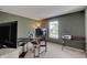 Office with a large desk, monitor, chair, and carpet flooring at 825 Palisades Ct, Greenwood, IN 46143