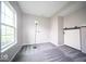 Bright room features a stylish sliding barn door and new carpeting at 844 Fireside Dr, Greenwood, IN 46143