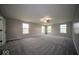 Vast carpeted bedroom is bright with natural light and features a ceiling fan at 844 Fireside Dr, Greenwood, IN 46143