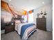 Decorated bedroom with basketball theme, featuring a large mural and complementing decor at 8502 Hemingway Dr, Indianapolis, IN 46239