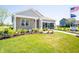 Beautiful single-story home showcasing a well-maintained lawn and attractive landscaping at 8502 Hemingway Dr, Indianapolis, IN 46239