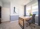 Cozy home office design featuring neutral paint with an open window and comfortable chair at 8502 Hemingway Dr, Indianapolis, IN 46239