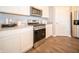 Modern kitchen featuring stainless steel appliances, white cabinets, and durable granite counters at 8502 Hemingway Dr, Indianapolis, IN 46239