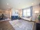Comfortable living area with ample seating, stylish decor, and a cozy rug, perfect for entertaining guests at 8502 Hemingway Dr, Indianapolis, IN 46239