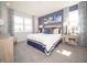 Stylish main bedroom with large windows, decorative curtains, and modern accents at 8502 Hemingway Dr, Indianapolis, IN 46239