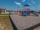Playground with blue slide and climbing structures in the community park area at 8502 Hemingway Dr, Indianapolis, IN 46239