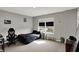 Relaxing bedroom featuring a dark bed, lots of natural light, and fun decor at 8583 Strabet Dr, Pendleton, IN 46064