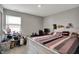 Bright bedroom features a large bed, ample natural light, and comfortable furnishings at 8583 Strabet Dr, Pendleton, IN 46064