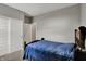 Cozy bedroom featuring a comfortable bed, closet space, and neutral color palette for a relaxing ambiance at 8583 Strabet Dr, Pendleton, IN 46064