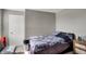 This bedroom has a soft gray couch, a dark colored bed, and a nice sized closet at 8583 Strabet Dr, Pendleton, IN 46064