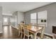 Dining room featuring wood floors and contemporary furniture with natural light at 8583 Strabet Dr, Pendleton, IN 46064