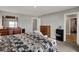 Spacious bedroom featuring wood furniture, neutral walls, and a door to the walk-in closet at 8583 Strabet Dr, Pendleton, IN 46064