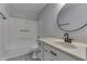 Clean bathroom features a shower and tub combo, modern fixtures, and a large vanity at 9034 Caminito Ct, Indianapolis, IN 46234