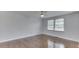 Bright bedroom featuring hardwood floors and a large window at 9034 Caminito Ct, Indianapolis, IN 46234