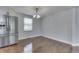Bright eat-in kitchen area featuring hardwood floors and stainless steel appliances at 9034 Caminito Ct, Indianapolis, IN 46234